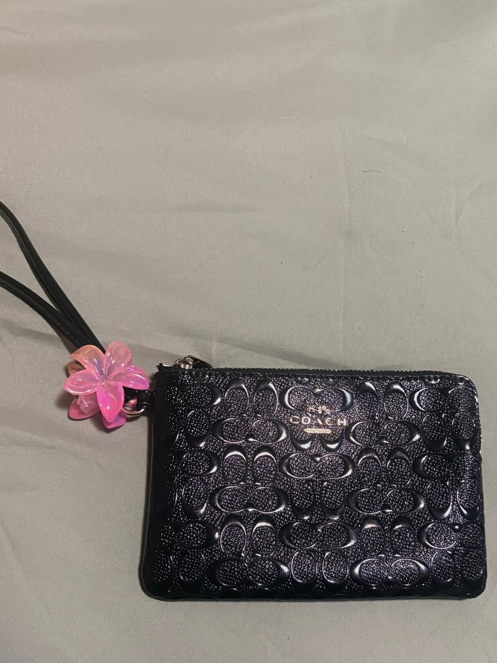 Coach Black Embossed Signature Wristlet in gold hardware